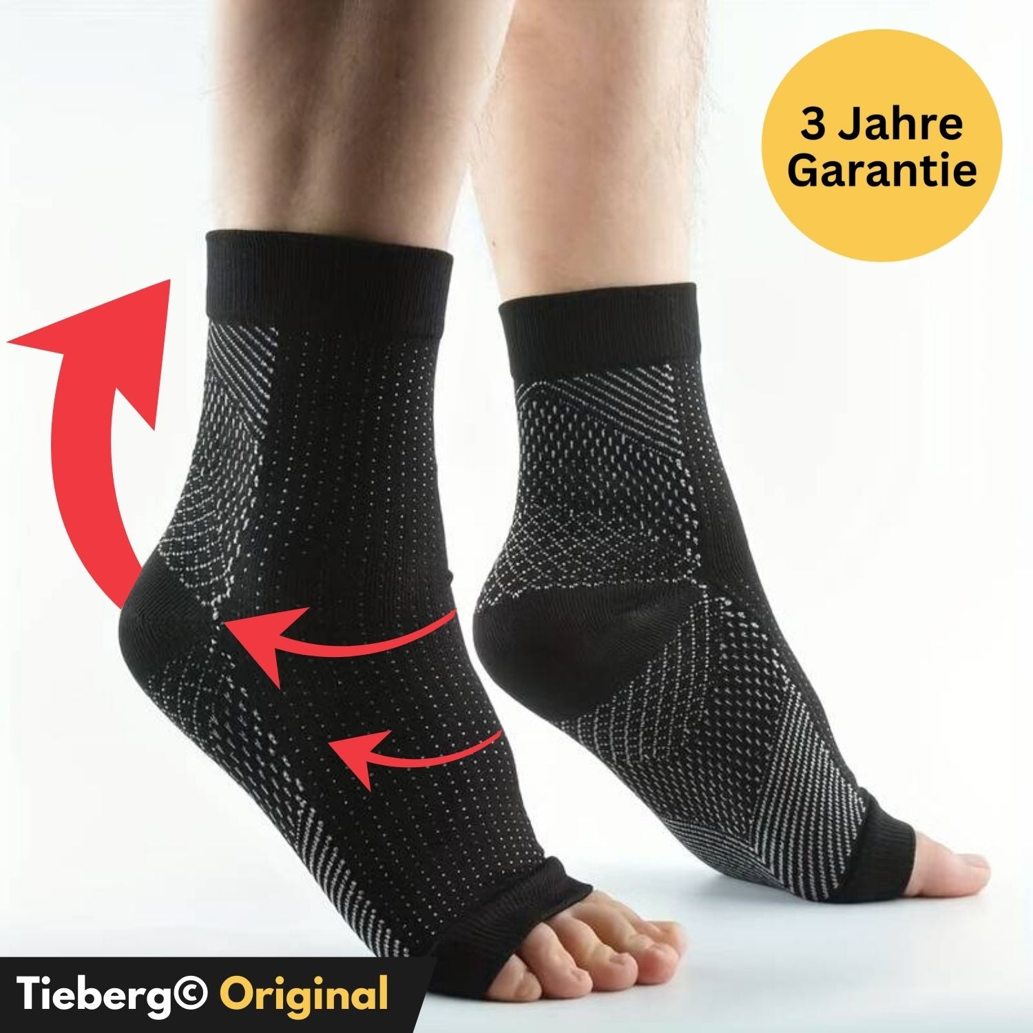 Zwei Füße in schwarzen, zehenoffenen Tieberg™️ Kompressionssocken mit weißen Pünktchen. Rote Pfeile markieren die Fuß- und Knöchelunterstützung. Ein gelber Kreis zeigt 